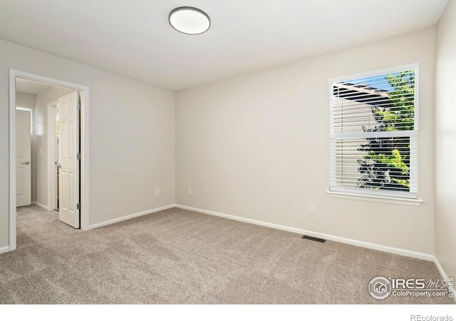 2262 Harvest St, Fort Collins, CO 80528 - carpeted empty room featuring baseboards