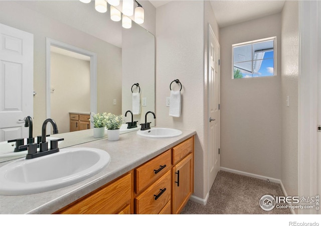 2262 Harvest St, Fort Collins, CO 80528 - full bath featuring double vanity and baseboards