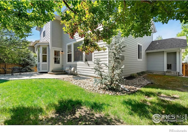 2262 Harvest St, Fort Collins, CO 80528 - rear view of house featuring a patio and entry steps