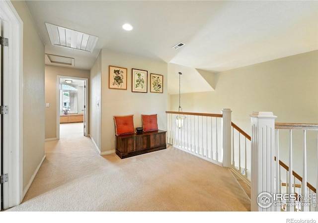 1145 Wyndemere Cir, Longmont, CO 80504 - hallway featuring carpet flooring, an upstairs landing, and attic access