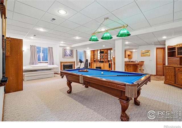 1145 Wyndemere Cir, Longmont, CO 80504 - rec room featuring carpet flooring, billiards table, a glass covered fireplace, and recessed lighting
