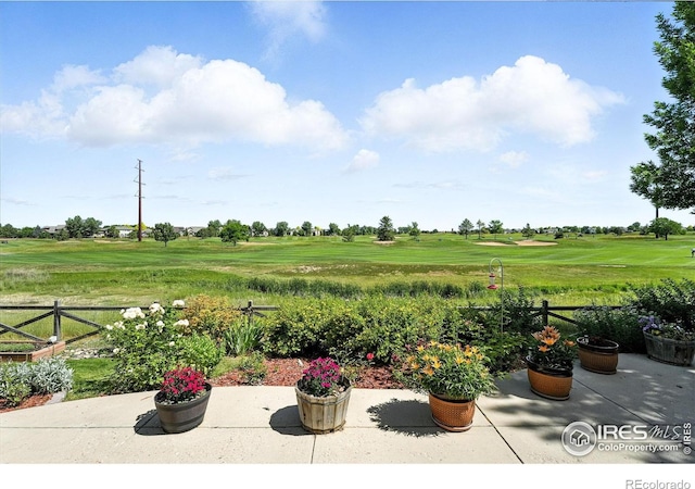 1145 Wyndemere Cir, Longmont, CO 80504 - view of patio / terrace featuring view of golf course