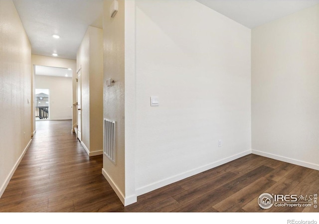 9929 Ceylon Ct, Commerce City, CO 80022 - hall with dark wood-style flooring and recessed lighting
