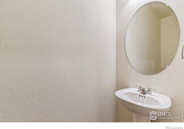 9929 Ceylon Ct, Commerce City, CO 80022 - bathroom featuring a sink