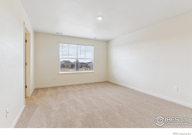 9929 Ceylon Ct, Commerce City, CO 80022 - carpeted empty room featuring baseboards