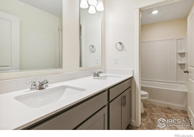 9929 Ceylon Ct, Commerce City, CO 80022 - bathroom featuring double vanity and shower / tub combination