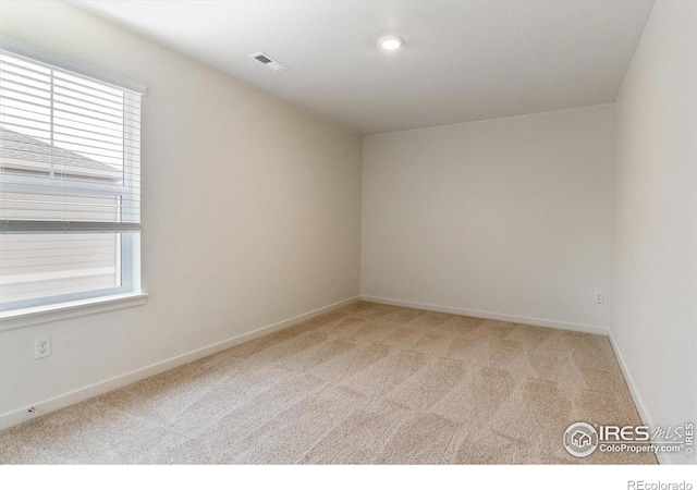 9929 Ceylon Ct, Commerce City, CO 80022 - empty room with healthy amount of natural light and light colored carpet