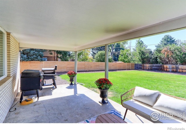 11230 W 77th Dr, Arvada, CO 80005 - fenced backyard with a patio