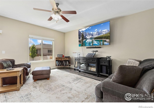 1705 Wales Dr, Berthoud, CO 80513 - living area with a ceiling fan and wood finished floors