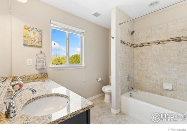 1705 Wales Dr, Berthoud, CO 80513 - bathroom featuring double vanity, tile patterned floors, and washtub / shower combination