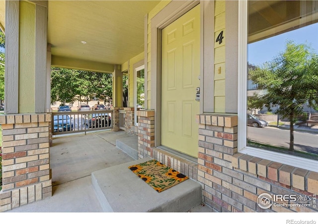 2702 Rigden Pkwy Unit F4, Fort Collins, CO 80525 - property entrance with a porch