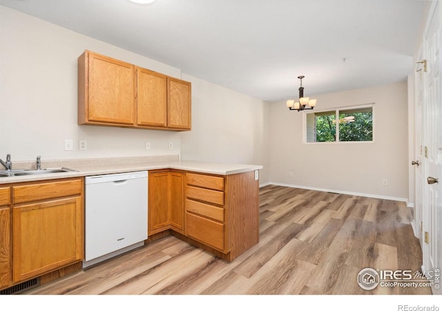 2702 Rigden Pkwy Unit F4, Fort Collins, CO 80525 - kitchen featuring dishwasher, a peninsula, light wood finished floors, and a chandelier