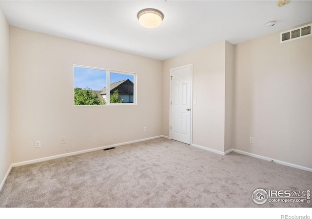 2702 Rigden Pkwy Unit F4, Fort Collins, CO 80525 - carpeted empty room with baseboards