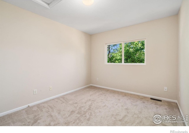2702 Rigden Pkwy Unit F4, Fort Collins, CO 80525 - carpeted empty room with baseboards