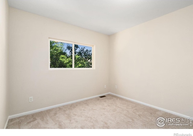 2702 Rigden Pkwy Unit F4, Fort Collins, CO 80525 - carpeted spare room with baseboards