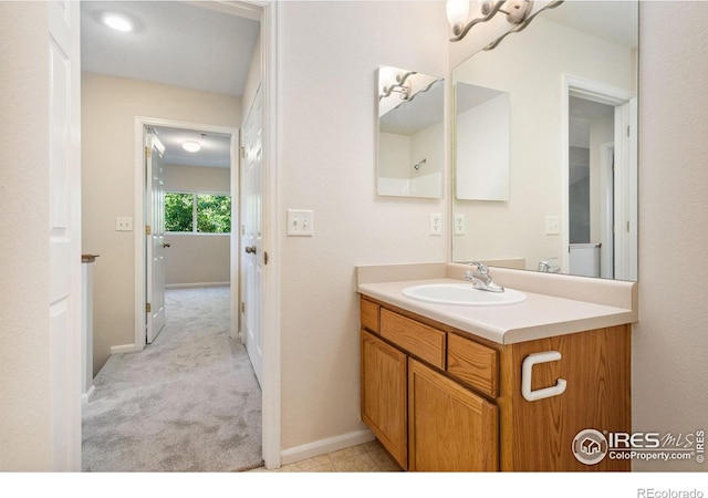 2702 Rigden Pkwy Unit F4, Fort Collins, CO 80525 - bathroom featuring vanity and baseboards