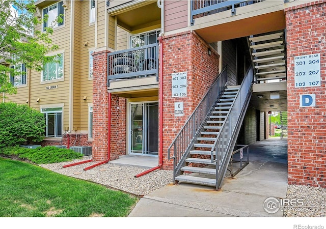 2133 Krisron Rd Unit D103, Fort Collins, CO 80525 - doorway to property featuring brick siding