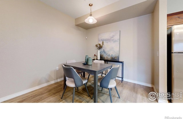 2133 Krisron Rd Unit D103, Fort Collins, CO 80525 - dining room featuring light wood finished floors and baseboards