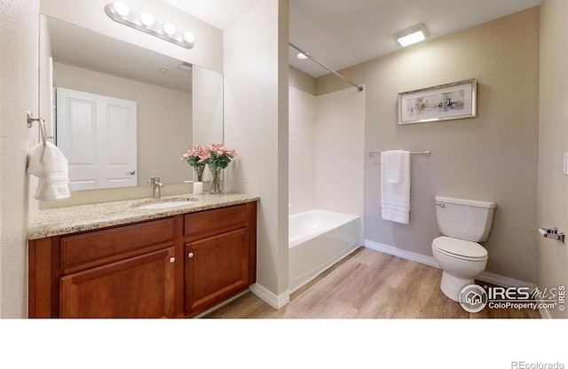 2133 Krisron Rd Unit D103, Fort Collins, CO 80525 - full bathroom with wood finished floors, vanity, and shower / washtub combination
