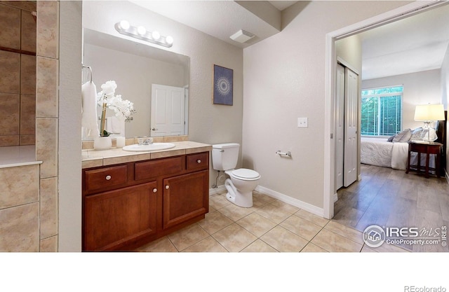 2133 Krisron Rd Unit D103, Fort Collins, CO 80525 - bathroom with vanity, connected bathroom, and tile patterned flooring