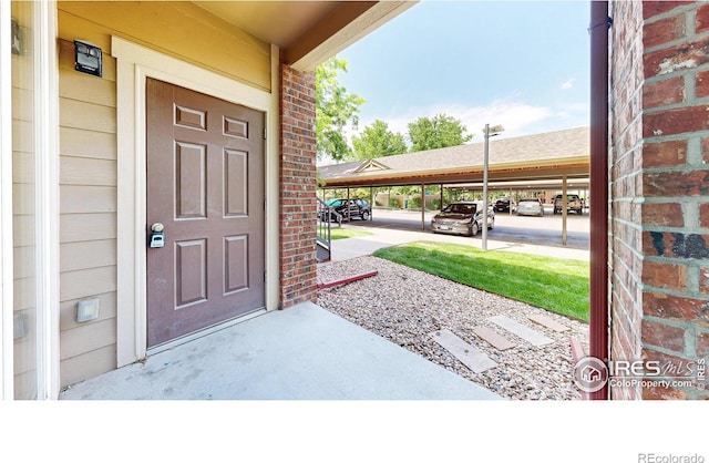 2133 Krisron Rd Unit D103, Fort Collins, CO 80525 - doorway to property with covered parking