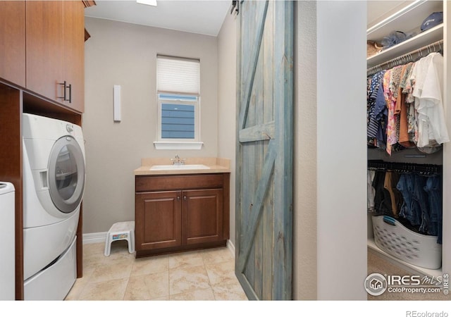 3304 Heron Lakes Pkwy, Berthoud, CO 80513 - laundry room featuring cabinet space and separate washer and dryer