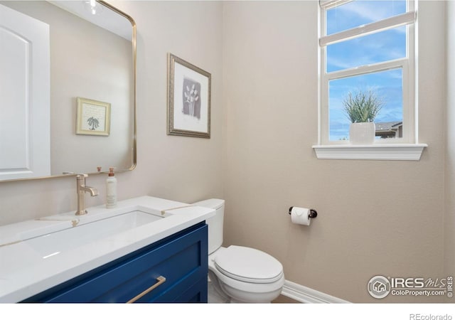 3304 Heron Lakes Pkwy, Berthoud, CO 80513 - half bath with vanity and toilet