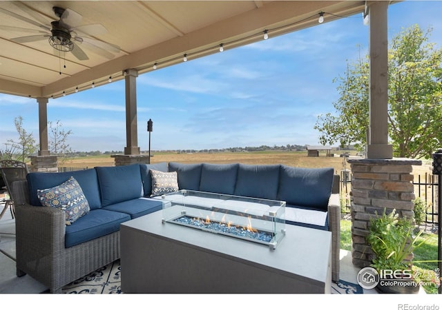3304 Heron Lakes Pkwy, Berthoud, CO 80513 - view of patio / terrace featuring an outdoor living space with a fire pit and ceiling fan