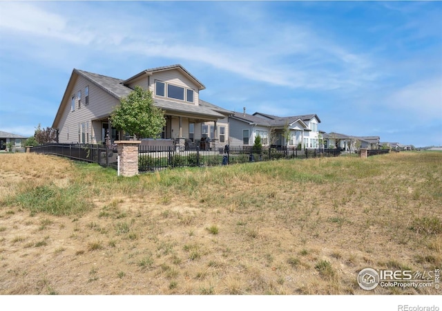 3304 Heron Lakes Pkwy, Berthoud, CO 80513 - view of front of home with a residential view