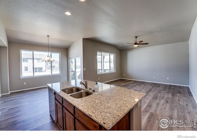 604 Rosedale St, Severance, CO 80550 - kitchen with a chandelier, wood finished floors, a textured ceiling, a ceiling fan, and hanging light fixtures