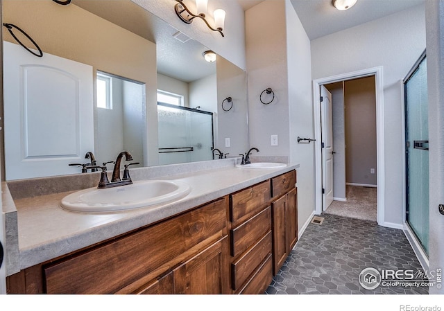 604 Rosedale St, Severance, CO 80550 - full bathroom with a shower stall and double vanity