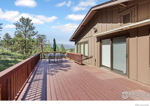 2160 Devils Gulch Rd, Estes Park, CO 80517 - wooden deck with outdoor dining space