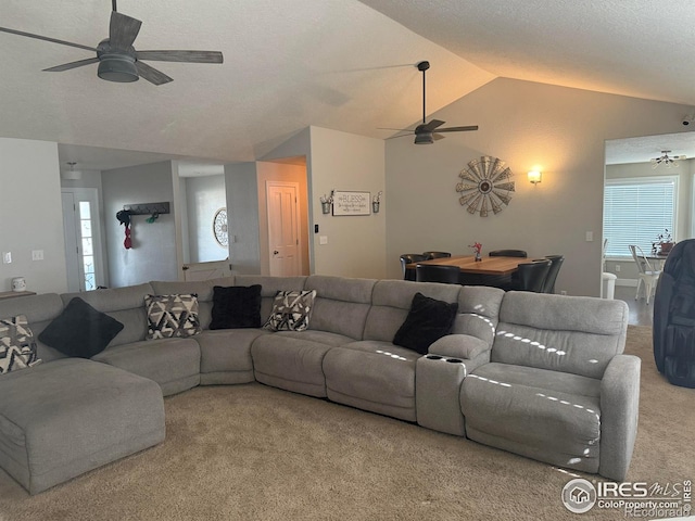 1460 Hawkridge Rd, Eaton, CO 80615 - carpeted living room featuring a ceiling fan and vaulted ceiling