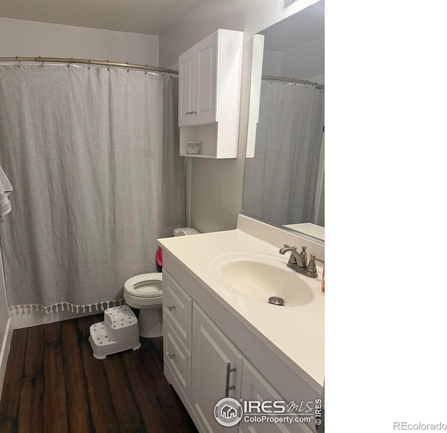 1460 Hawkridge Rd, Eaton, CO 80615 - full bath featuring vanity and wood finished floors