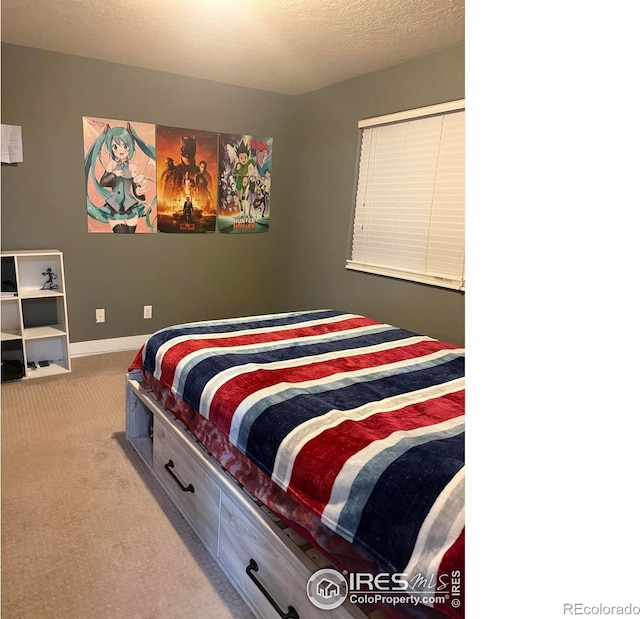 1460 Hawkridge Rd, Eaton, CO 80615 - bedroom with light colored carpet and baseboards