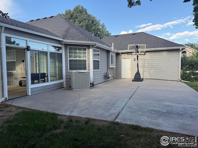 1460 Hawkridge Rd, Eaton, CO 80615 - rear view of property with a patio area and a shingled roof