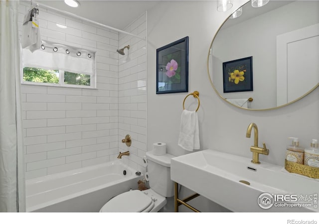 7131 Pontiac St, Commerce City, CO 80022 - full bath featuring shower / bath combo with shower curtain and toilet
