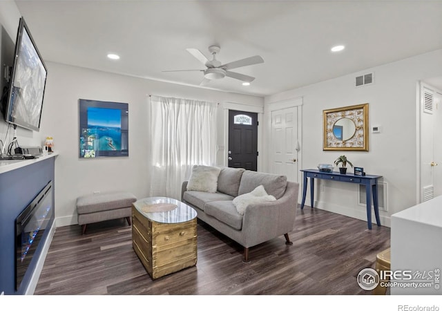 7131 Pontiac St, Commerce City, CO 80022 - living area with dark wood-type flooring, recessed lighting, and a ceiling fan