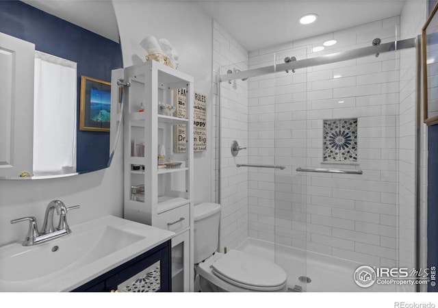 7131 Pontiac St, Commerce City, CO 80022 - bathroom featuring a stall shower, vanity, and recessed lighting
