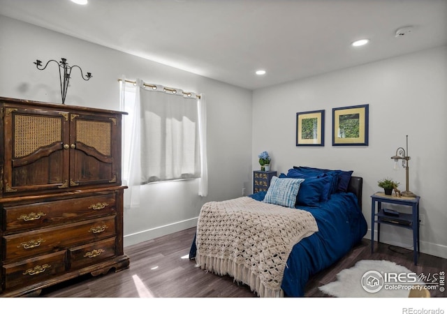 7131 Pontiac St, Commerce City, CO 80022 - bedroom featuring wood finished floors and recessed lighting