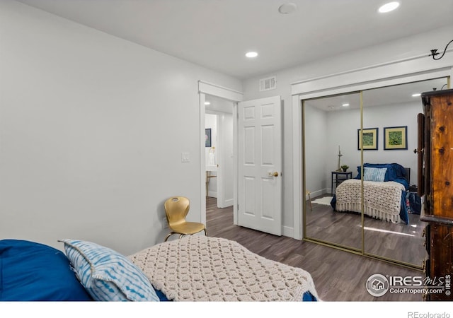 7131 Pontiac St, Commerce City, CO 80022 - bedroom with wood finished floors, recessed lighting, and a closet