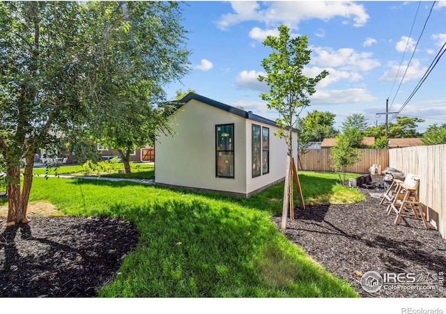 7131 Pontiac St, Commerce City, CO 80022 - view of property exterior with stucco siding