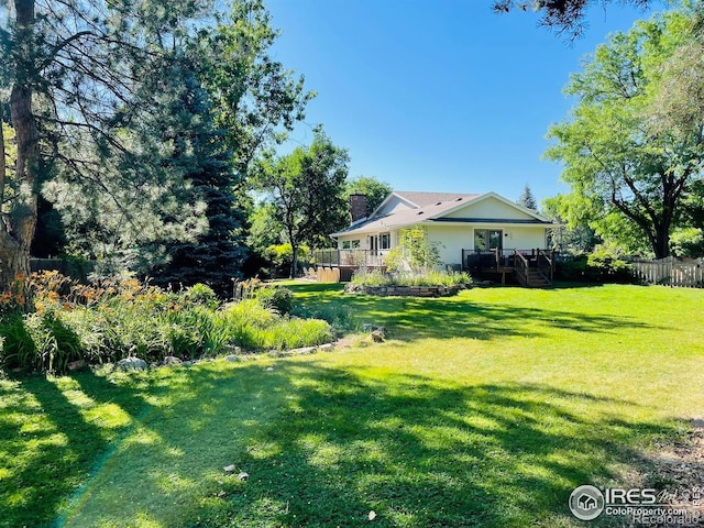 4303 30th St, Boulder, CO 80301 - view of yard with a wooden deck and stairs