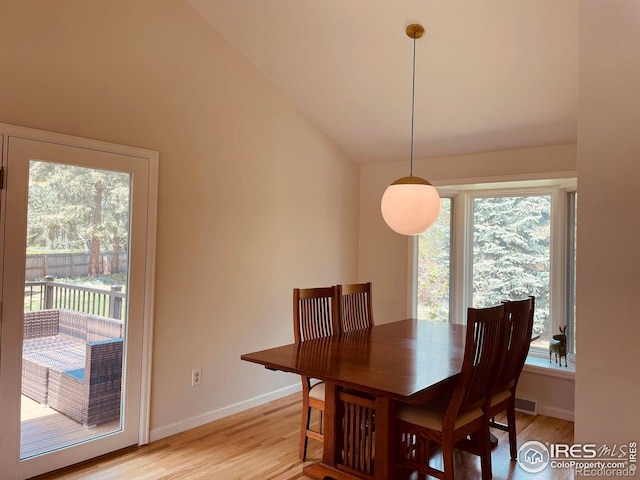 4303 30th St, Boulder, CO 80301 - dining room with light wood-type flooring and vaulted ceiling