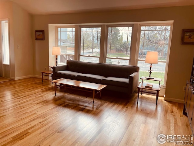 4303 30th St, Boulder, CO 80301 - living area with light wood-style floors and healthy amount of natural light