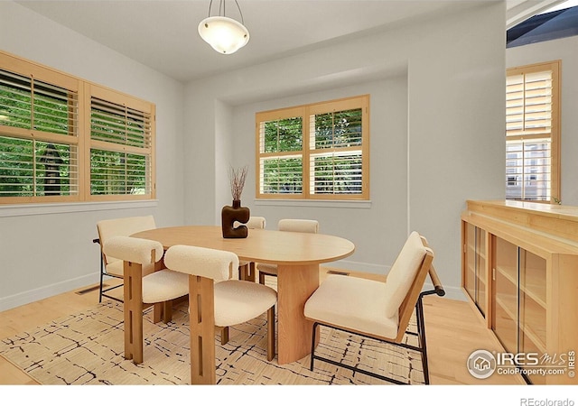2861 Shoshone Trl, Lafayette, CO 80026 - dining room featuring wood finished floors