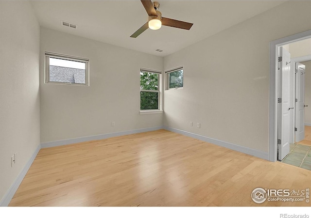 2861 Shoshone Trl, Lafayette, CO 80026 - unfurnished room featuring light wood finished floors and ceiling fan