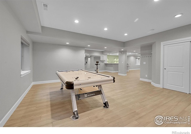2861 Shoshone Trl, Lafayette, CO 80026 - game room with light wood finished floors and recessed lighting