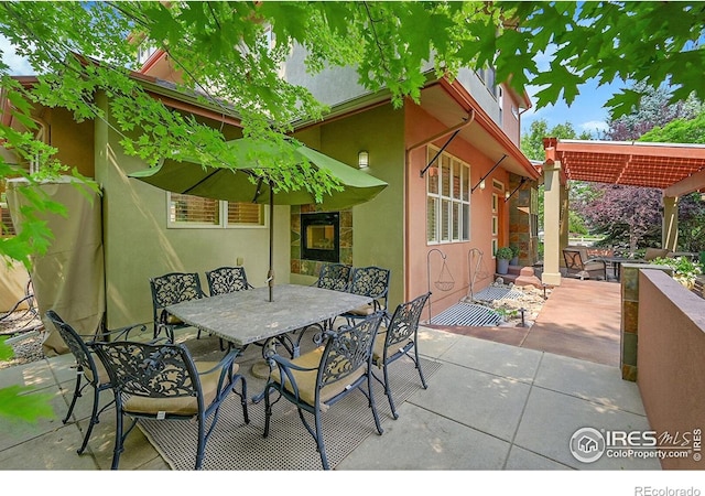 2861 Shoshone Trl, Lafayette, CO 80026 - view of patio / terrace featuring outdoor dining space and a pergola