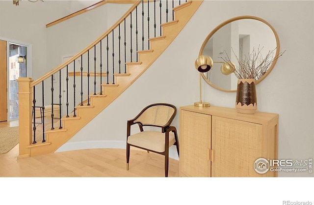 2861 Shoshone Trl, Lafayette, CO 80026 - staircase featuring wood finished floors and baseboards